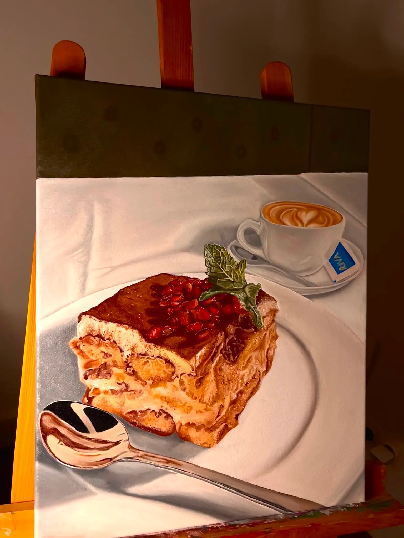 Realist oil painting of a slice of tiramisu with a cappuccino, painted by Ana Kovač